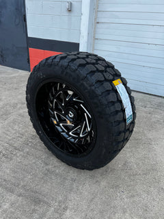22x12 8x6.5 Gear 755BM wheels and 35x12.50 Ironman MT tires