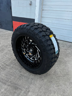 22x12 8x6.5 Gear 755BM wheels and 35x12.50 Ironman MT tires