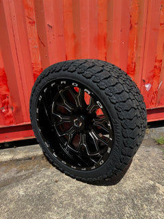 22x12 8x6.5 TIS 560BM wheels and 33x12.50 Venom Swamp Thing XAT - F tires
