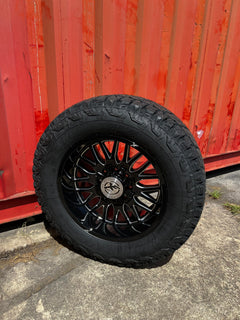20x10 8x6.5 & 8x170 XF Off-Road XF-240 Gloss Black & Milled wheels and 35x12.50 Thunderer ATR tires