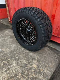 20x10 6x5.5 & 6x135 Luxx Hd LHD19 Gloss Black Milled wheels and 35x12.50 Versatyre RT HD tires